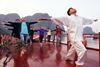 Sunrise Tai-chi exercise - Oriental Sails Cruise