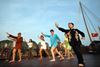 Tai Chi lesson on the sundeck-Imperial Legend cruise